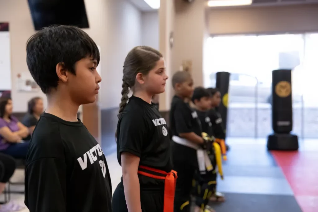 Girl and Boy Standing And Waiting For Karate Drills for Young Children in Leesburg, Virginia
