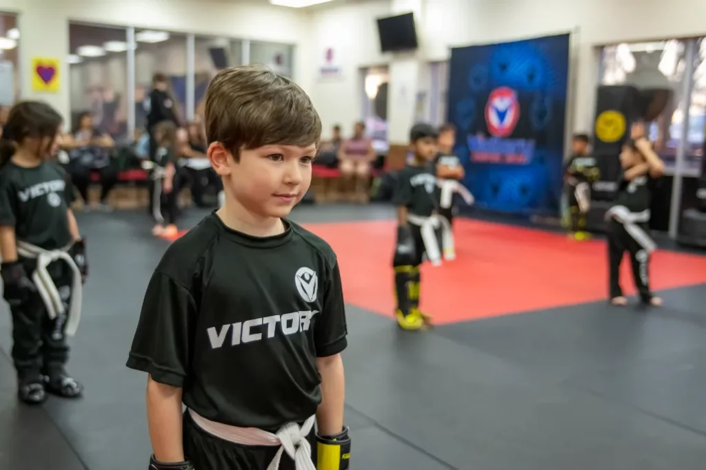Boy in Victory Martial Arts Black Shirt at Kids Karate Class in Boca Park, Nevada