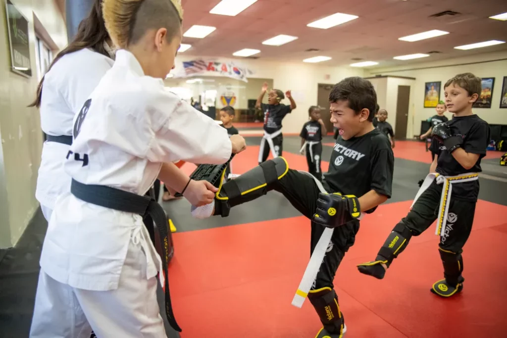 Boy Practices Kicking During the Victory Martial Arts Program in Lake Mary, Florida