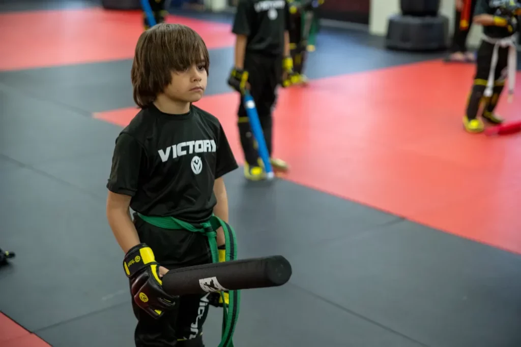 Boy in Victory Martial Arts Black Shirt at Kids Karate Class in Dr. Phillips, Florida